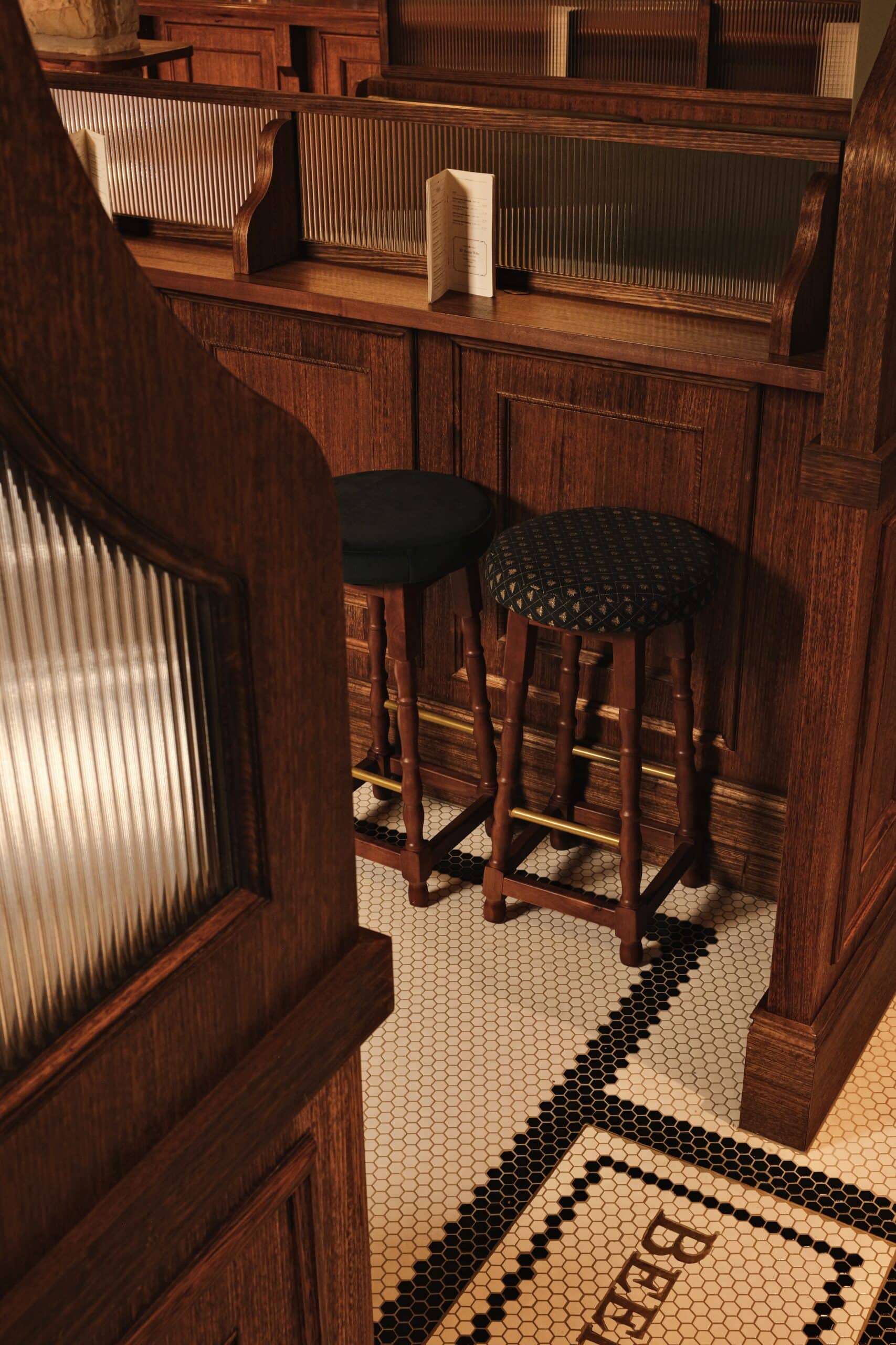 the beekeeper bondi interior shot mosaic floor bar stools