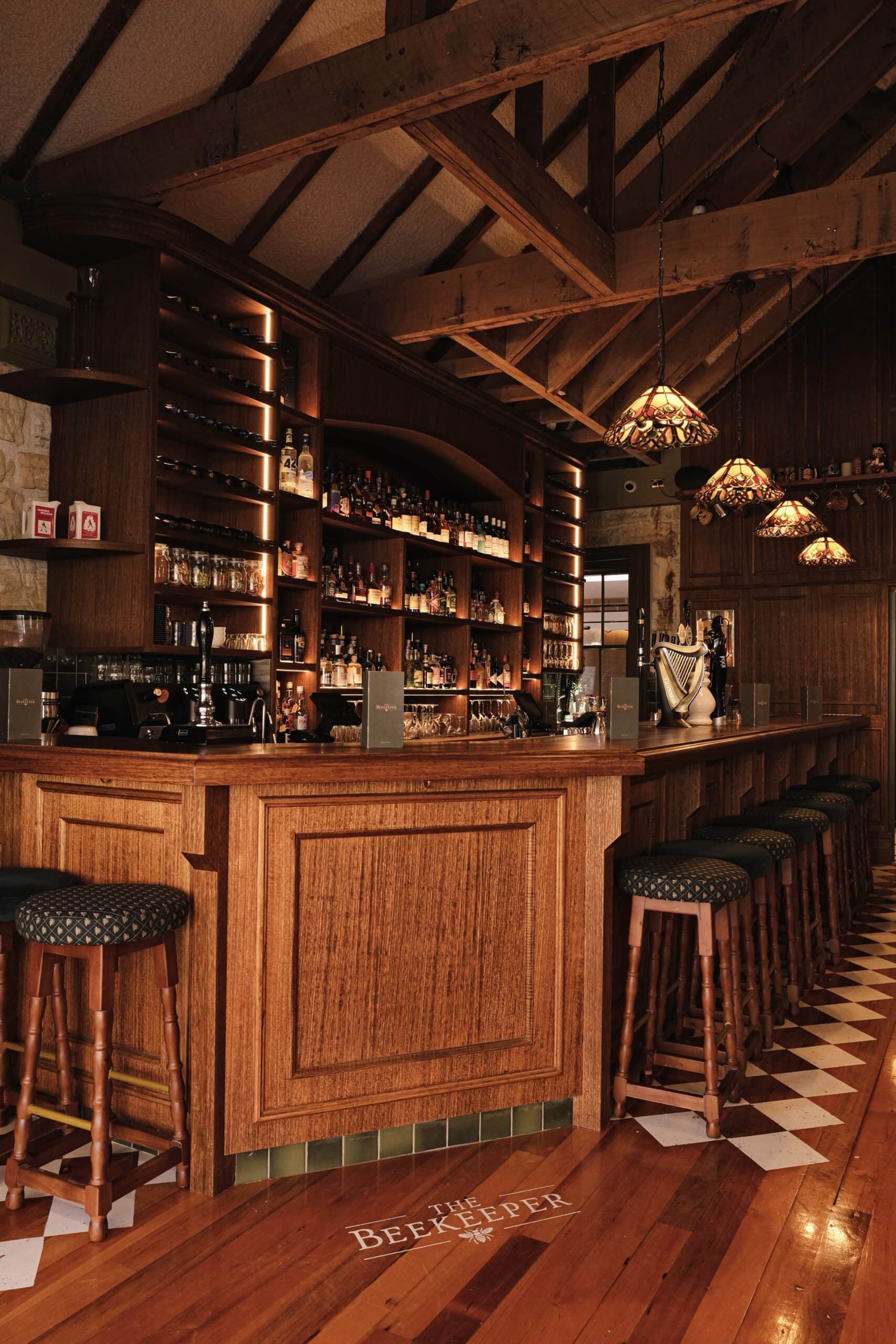 the beekeeper bondi interiors wooden bar and drinks