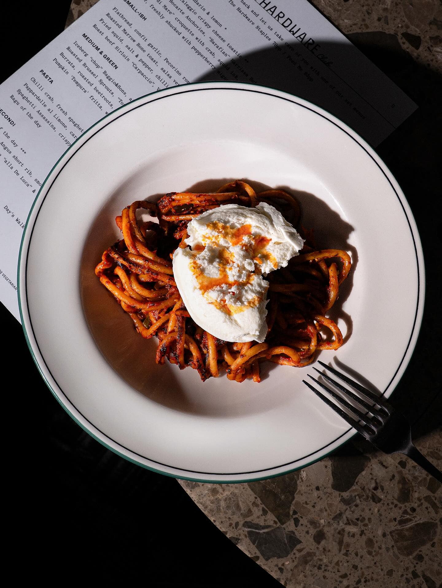 Pasta assaggini topped with burrata and chilli, an Italian dish at The Hardware Club in Melbourne CBD