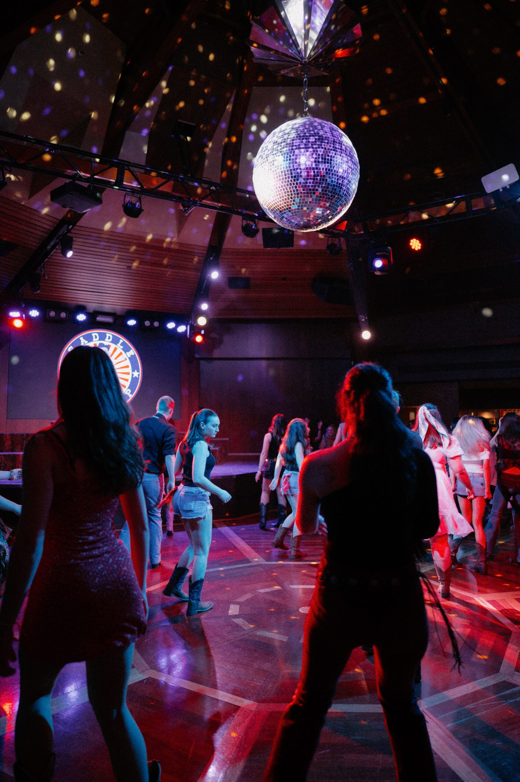 People line dancing at Saddle & Stomp event in Adelaide.