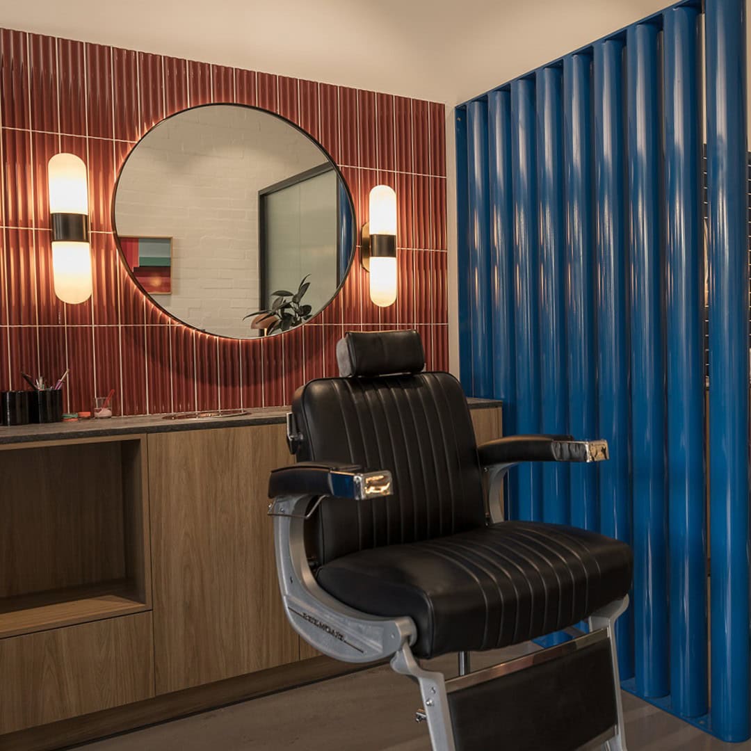 Studio interior with barber chair and mirror at The Brows Crows Nest Sydney