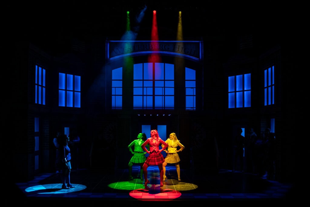 Actors on stage as part of Heathers The Musical.