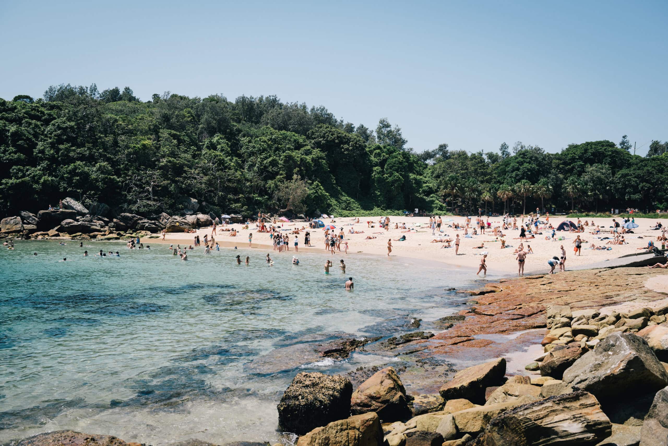 Swimmers at Shelly Beach in Manly on a sunny day, Sydney