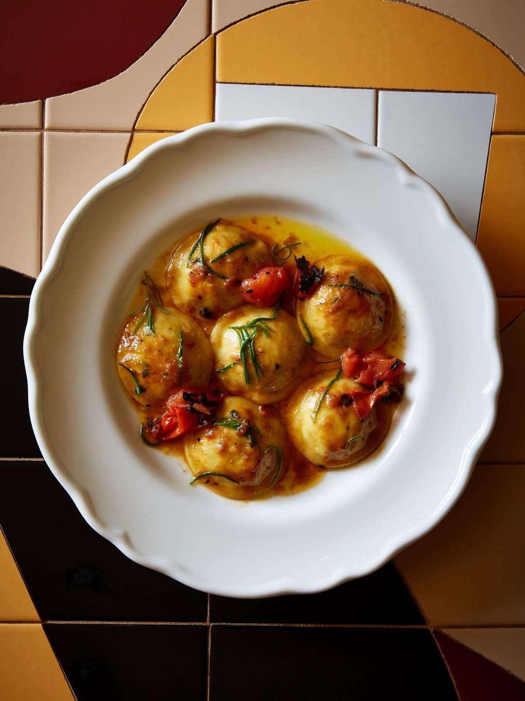 A frilled white ceramic plate filled with pasta from Sydney favourite Shell House.