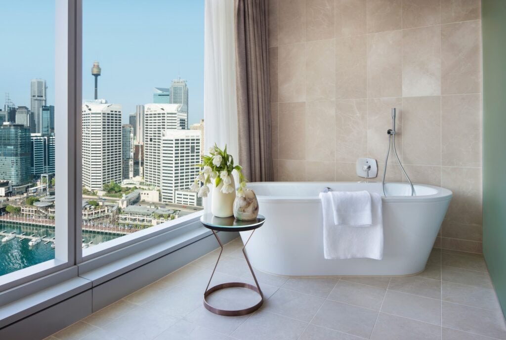 A bath overlooking Darling Harbour at the Sofitel Darling Harbour. 