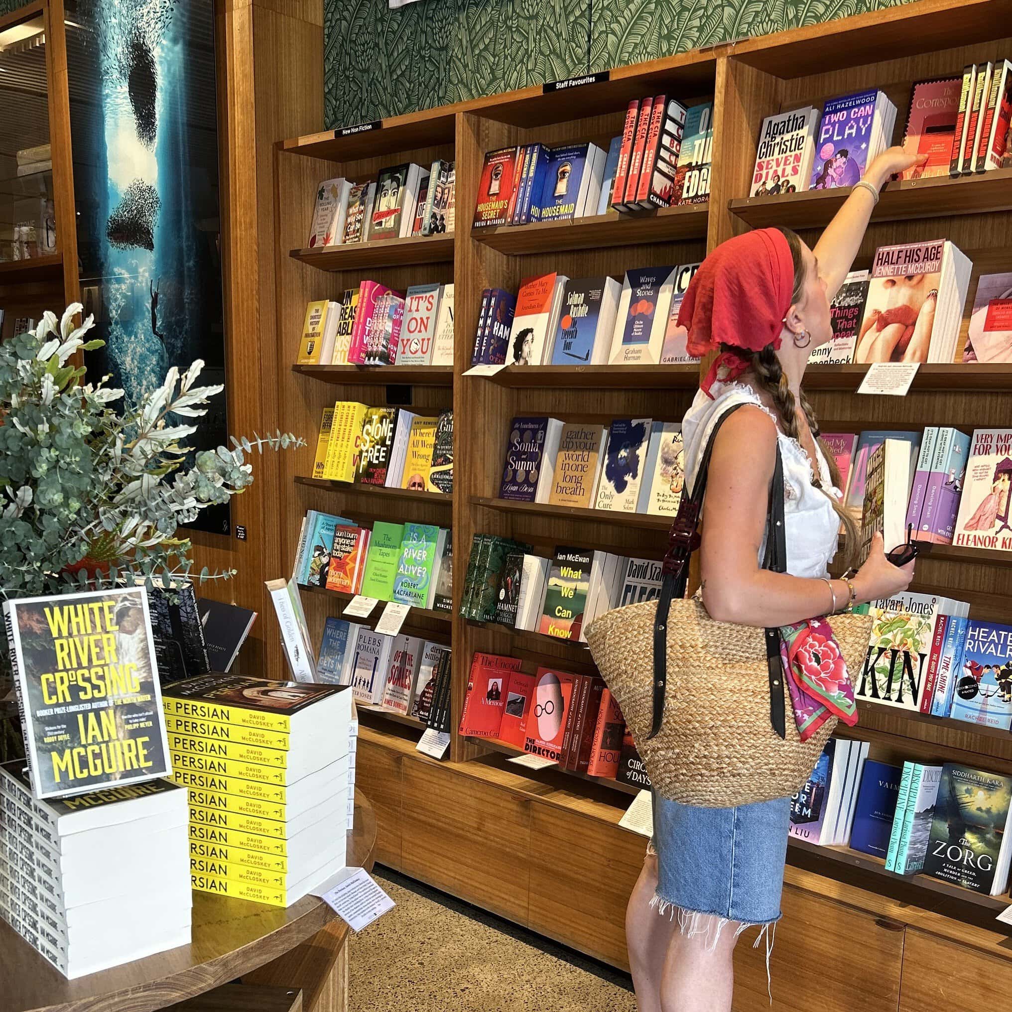 Customer browsing bookshelves at Bookoccino Avalon Beach Sydney