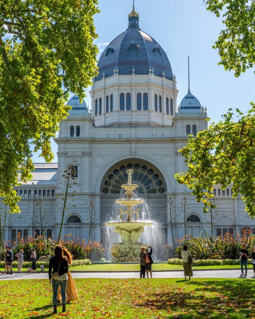 carlton gardens in melbourne, victoria with the state exhibition building and fountain