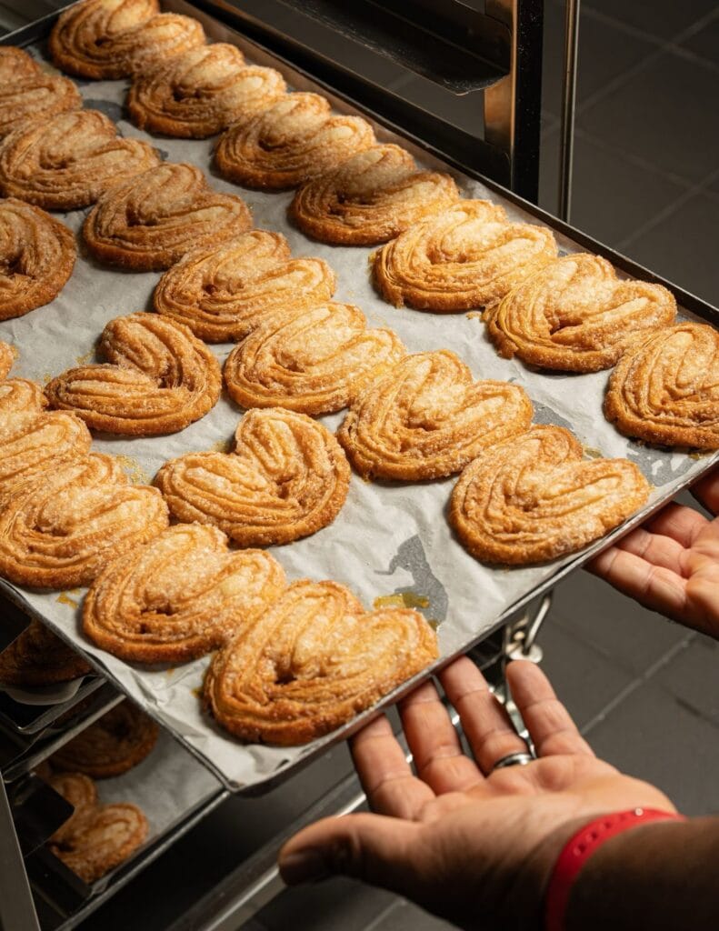 Gluten-free palmiers pastries on baking tray at Sebastien Sans Gluten Leichhardt Sydney