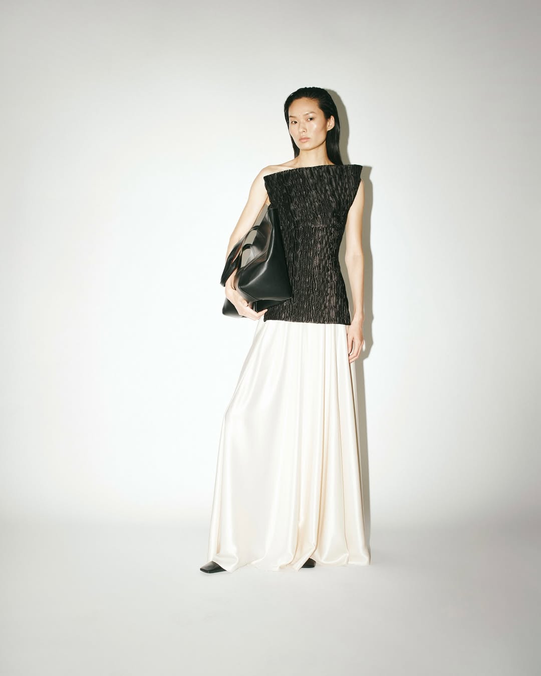 christopher esber black top with long white silk skirt