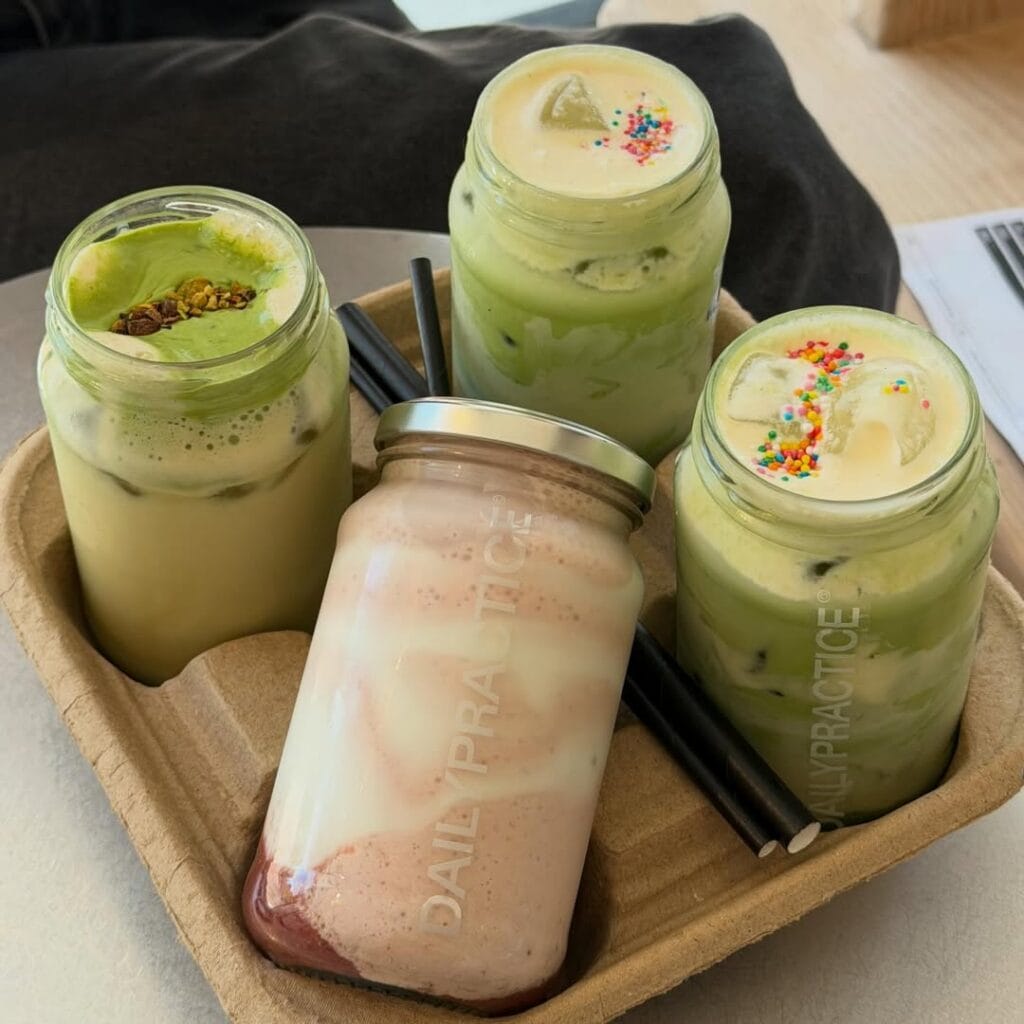 a coffee tray filled with specialty sips from Daily Practice