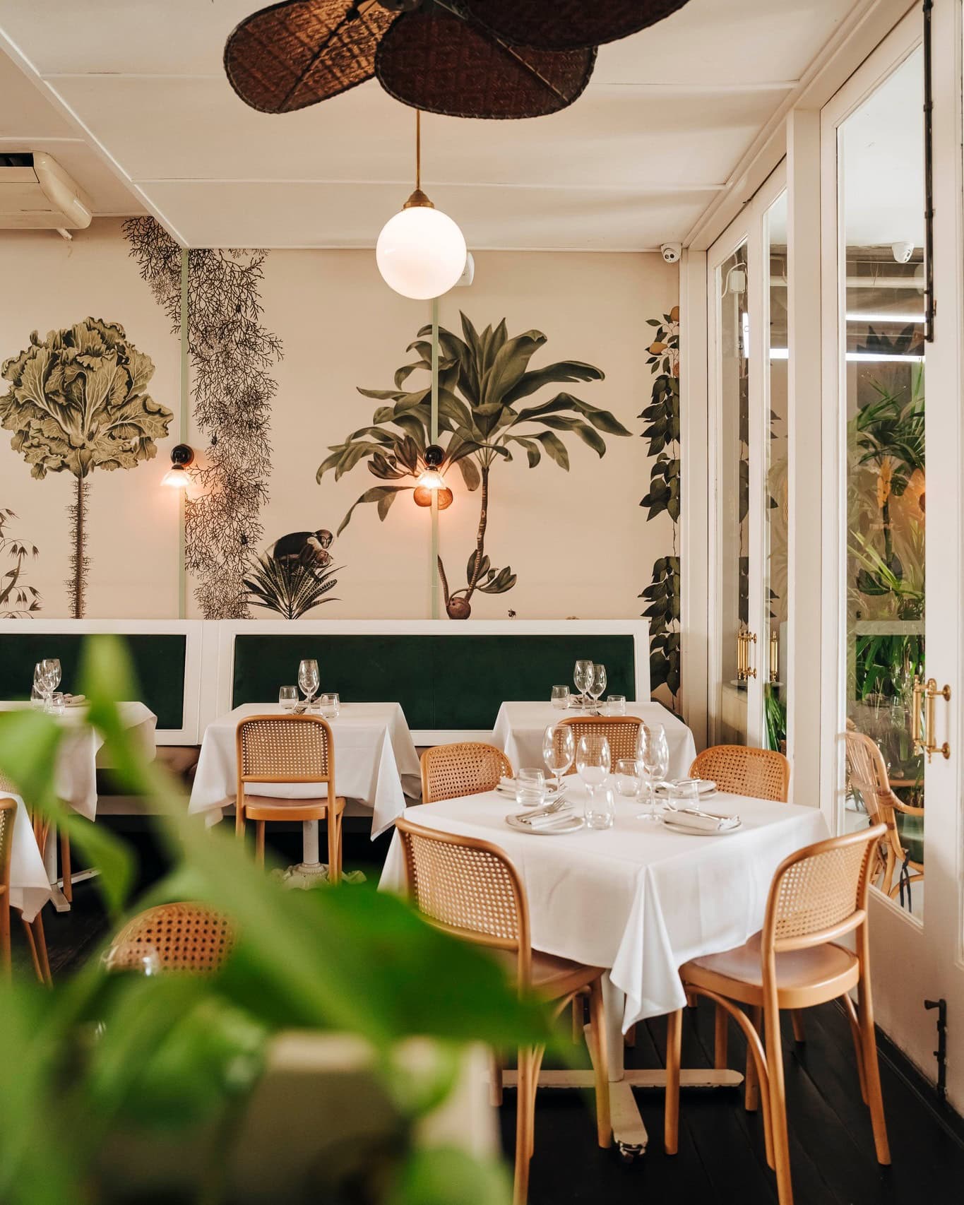 The tropical-themed dining room at The Butler in Potts Point.