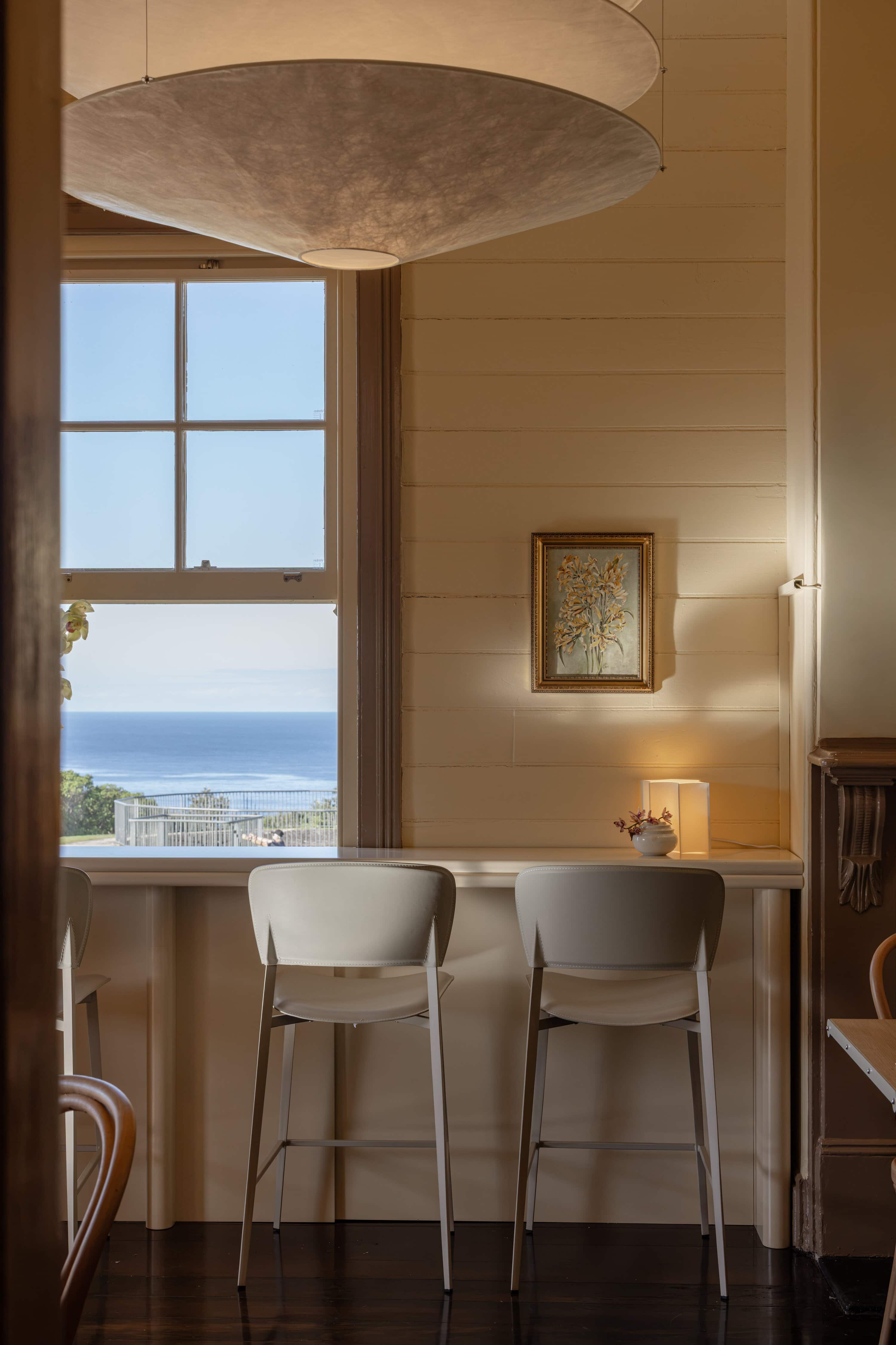 Dining nook with ocean view at Eddie's Newcastle NSW