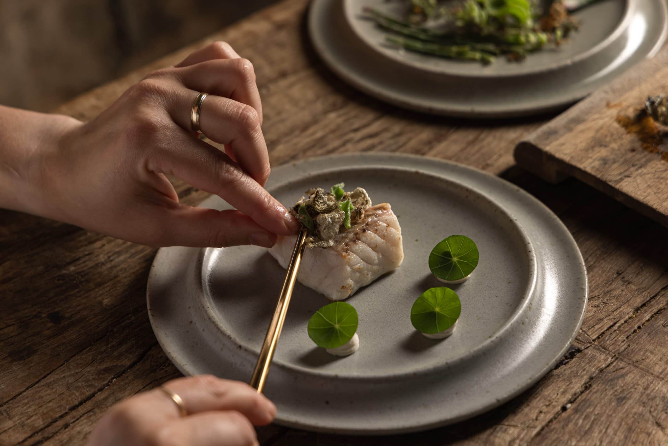 Chef assembling dish at Hentley Farm in South Australia.