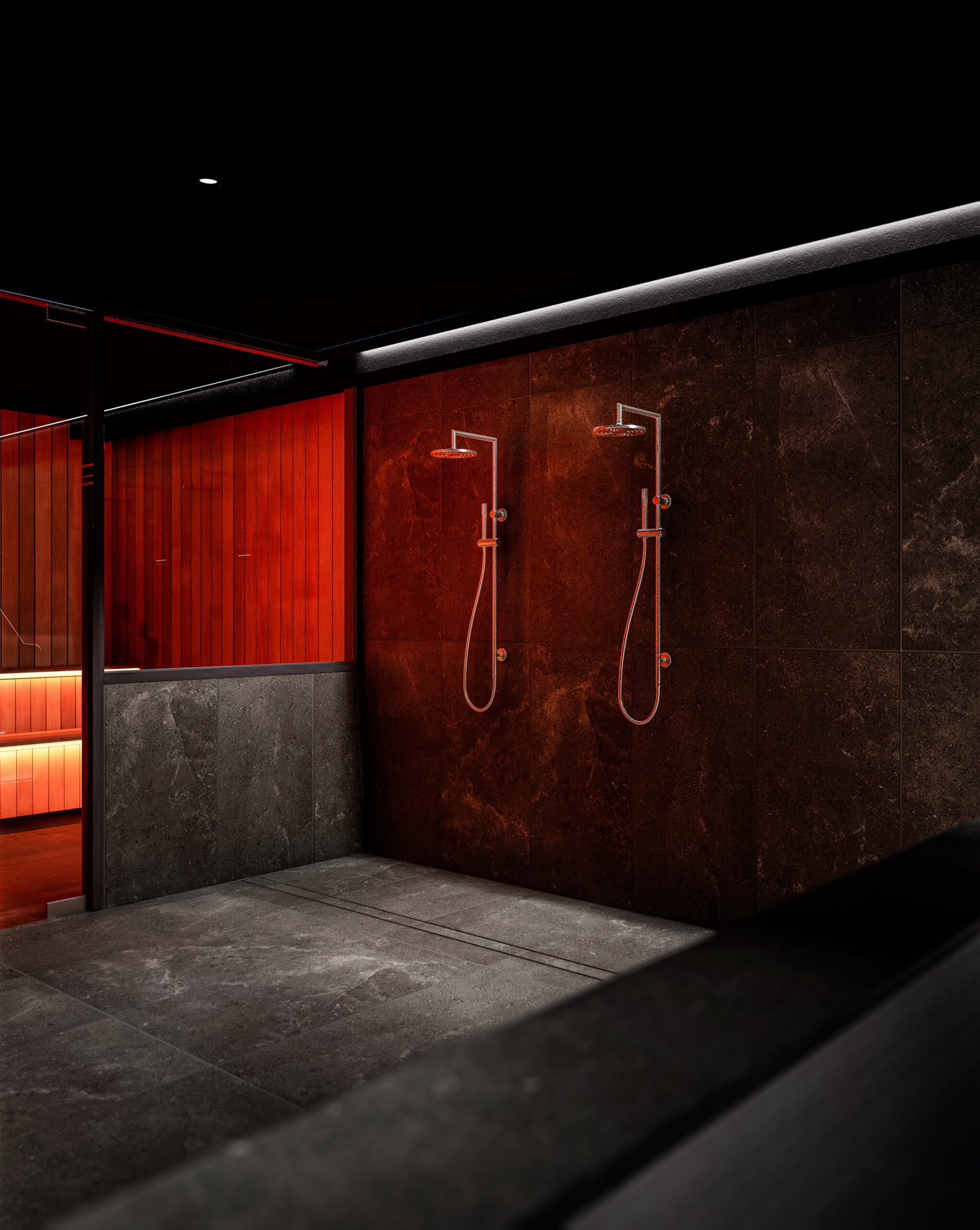 A render of Level Eleven's sauna and cold shower space, with deep charcoal stone tiles, twin rainfall showerheads and a red-lit timber sauna visible through glass.