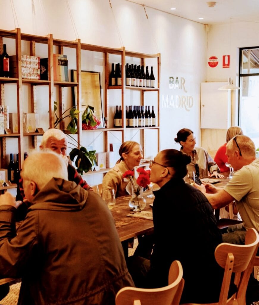 People at long table at Bar Madrid in Adelaide.