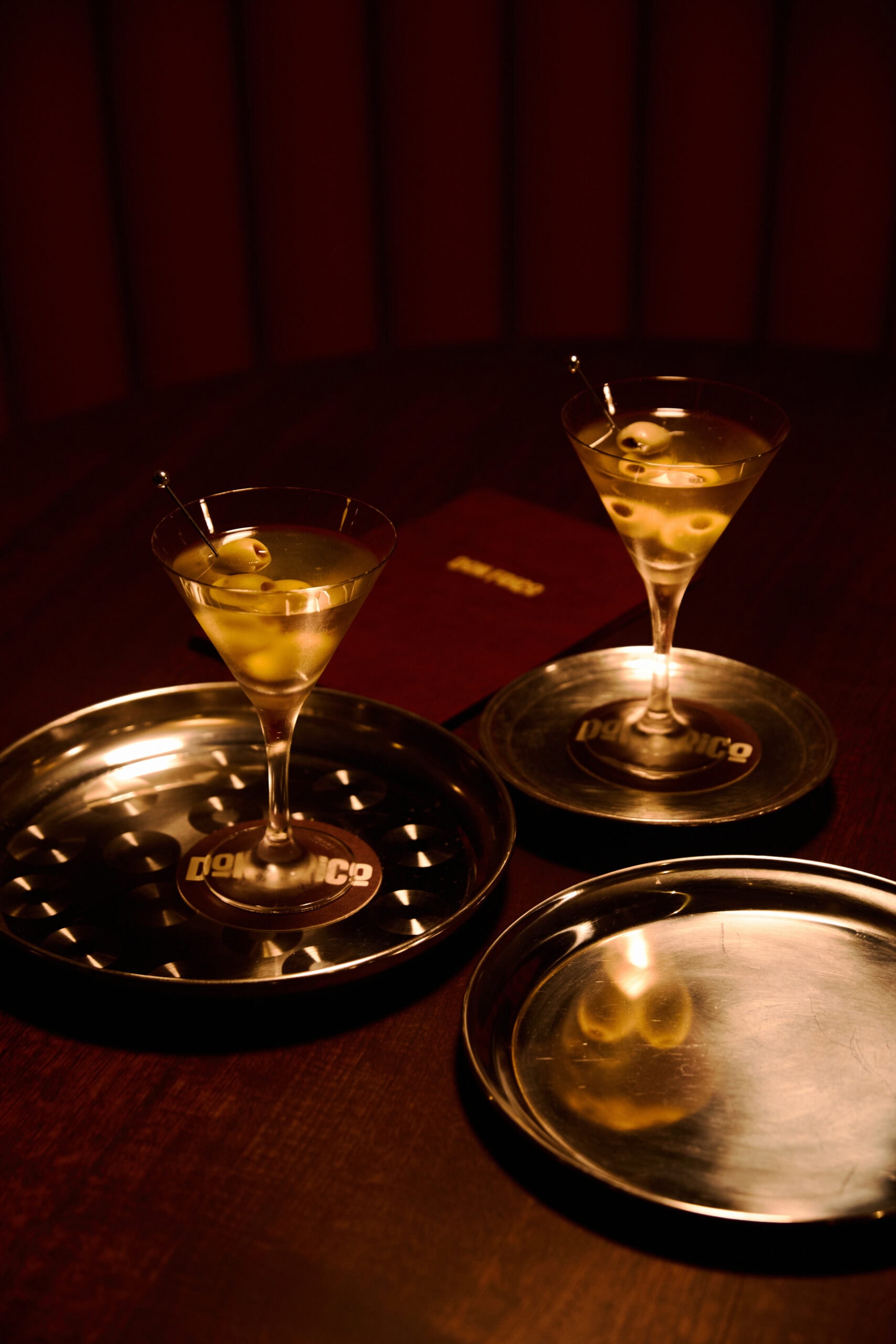 Ice-cold martinis on the bar at Don Frico, a late-night pizza and cocktail bar in Hobart.