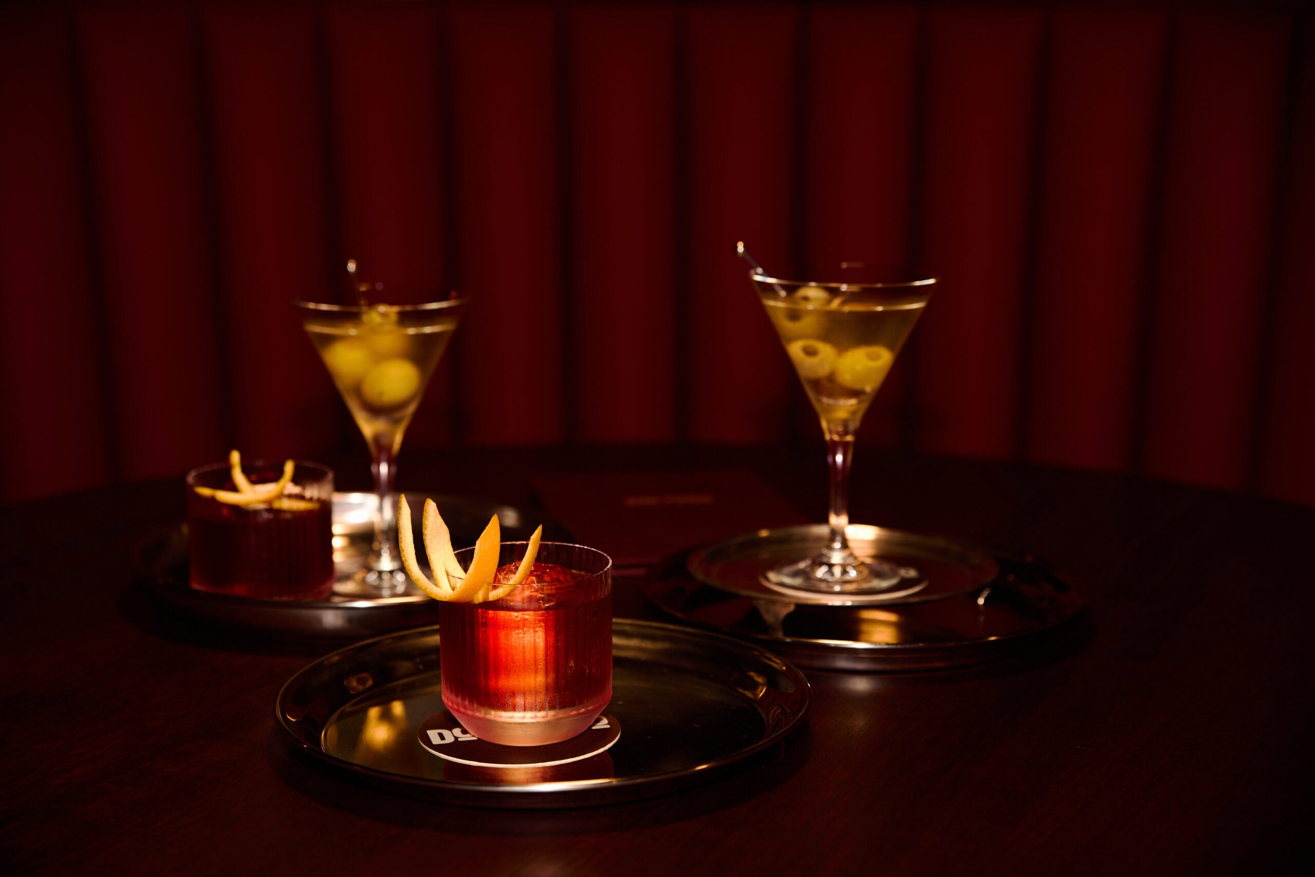 Ice-cold martinis on the bar at Don Frico, a late-night pizza and cocktail bar in Hobart.
