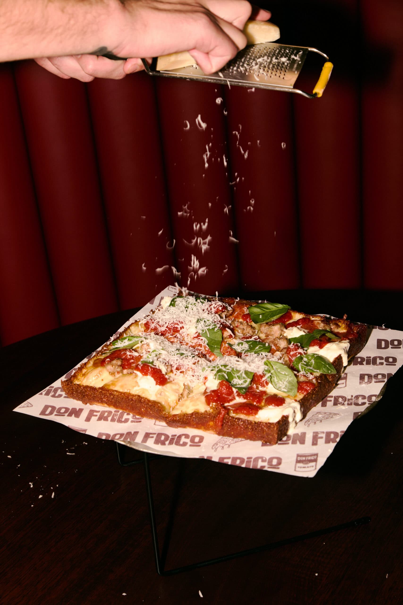 New York-style pizza slices and Detroit-style square pizza at Don Frico Hobart.