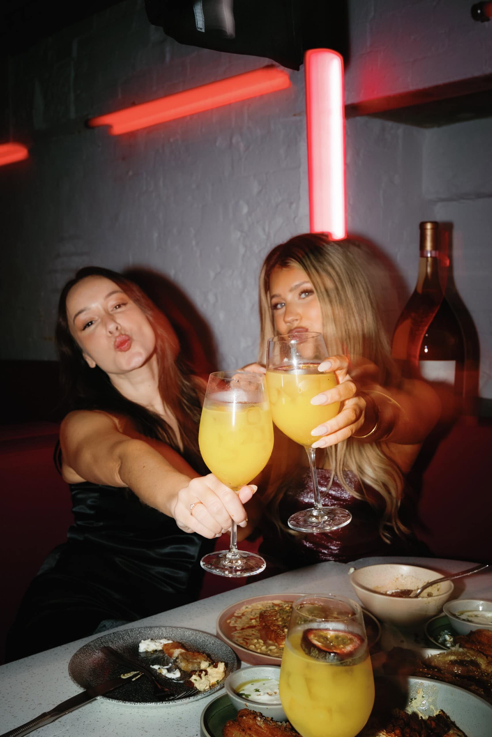 Guests toasting with cocktails at Zaffi Sydney CBD Pasta Thursdays bottomless dining