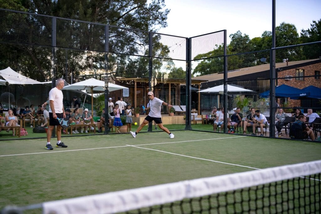 Players playing padel at Tribe Padel and Wellness.