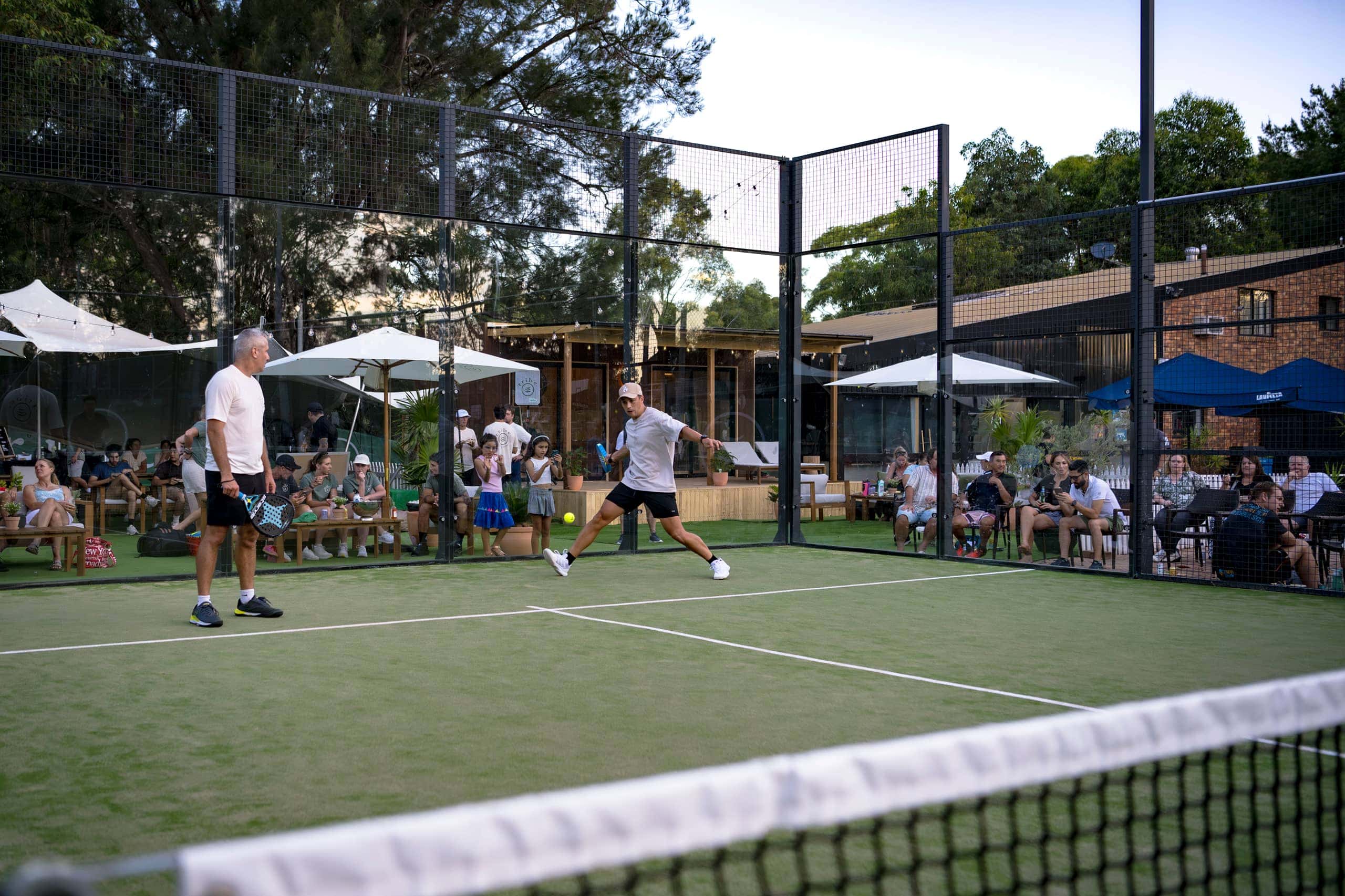 Players playing padel at Tribe Padel and Wellness.