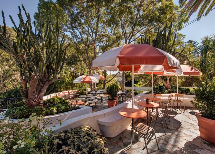 Peach and white umbrellas in the outdoor beer garden of the newport.