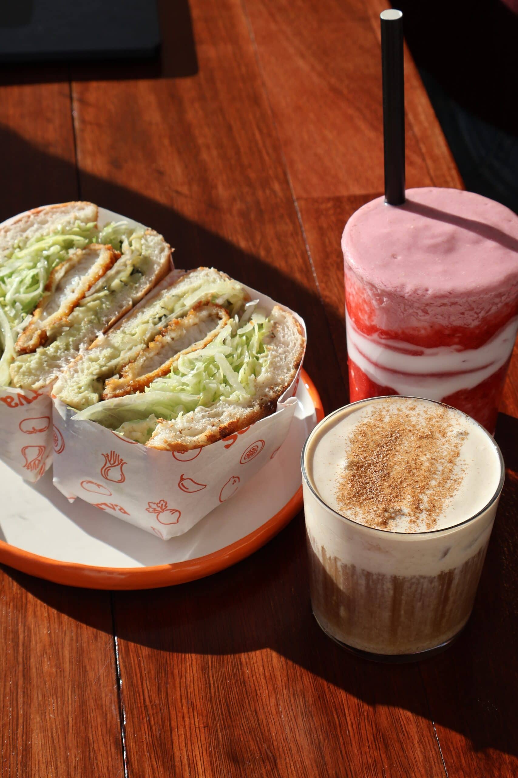 Chicken katsu sando with smoothie and iced coffee at Serva Freshwater Sydney