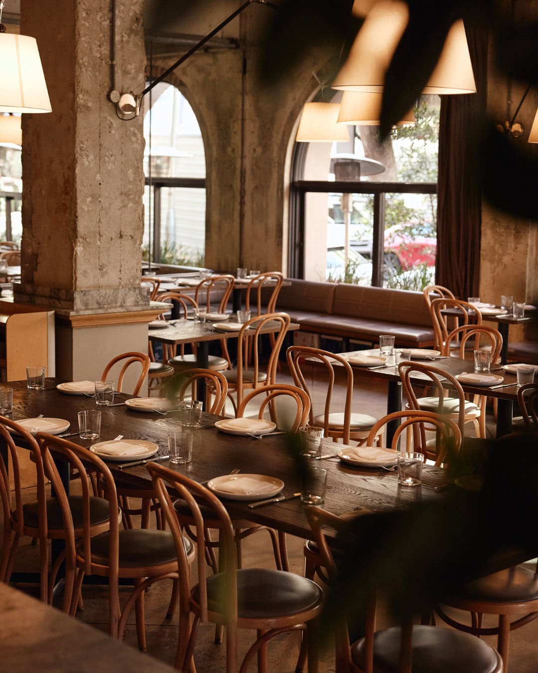 The warm-toned dining room at The Apollo in Sydney.