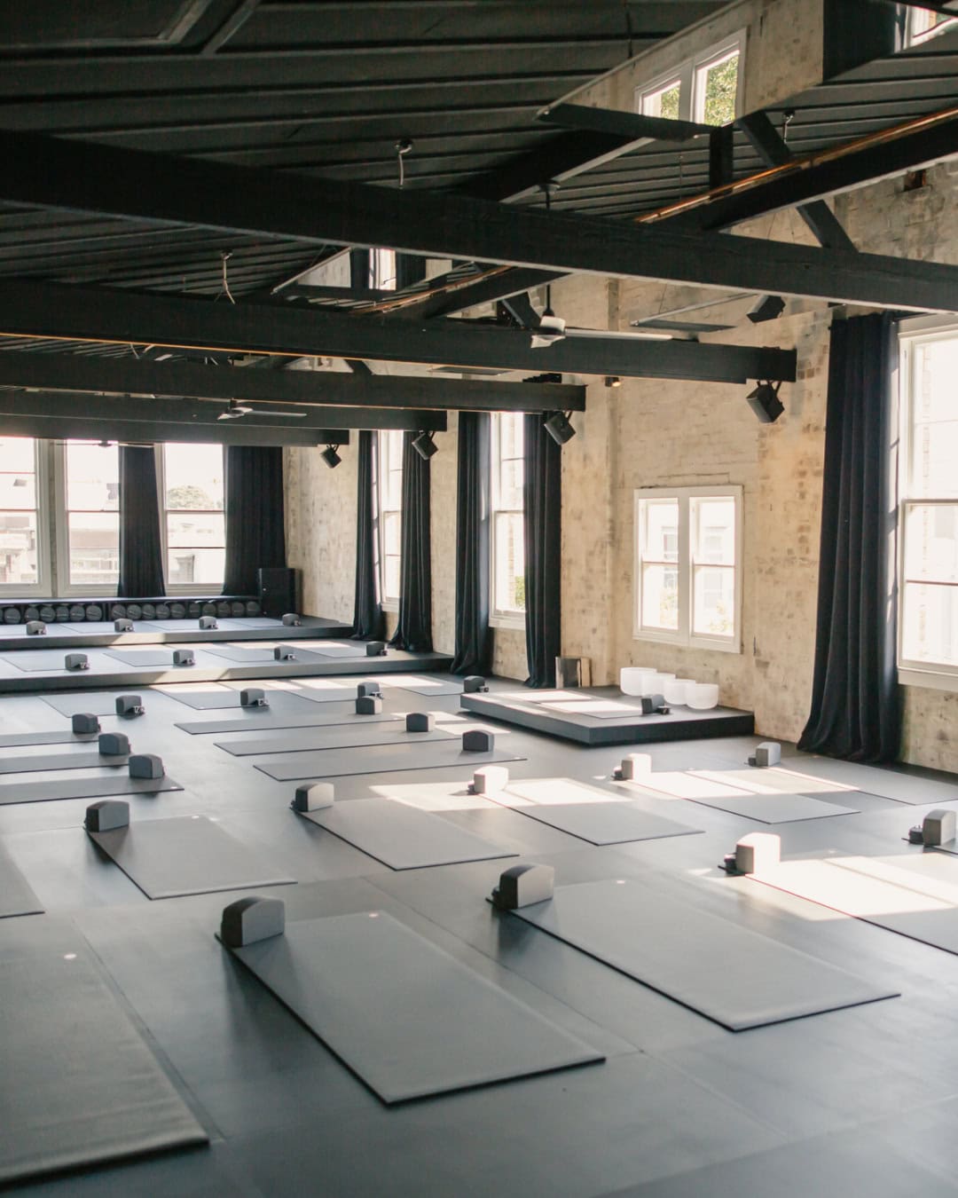 The loft-style and monochromatic studio at humming puppy in redfern.