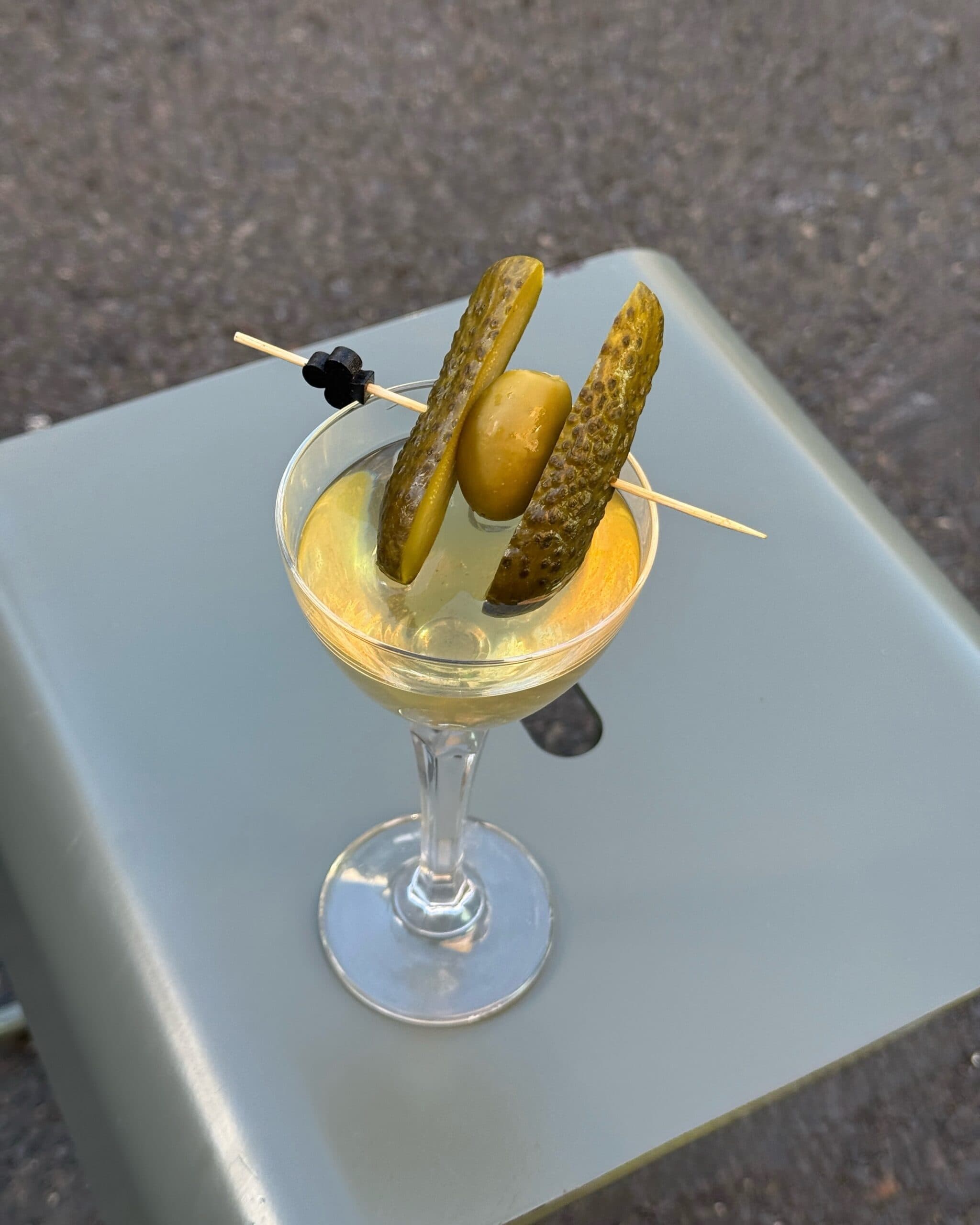 The Big Dill pickle martini with olive garnish at Arm's Length Sydney