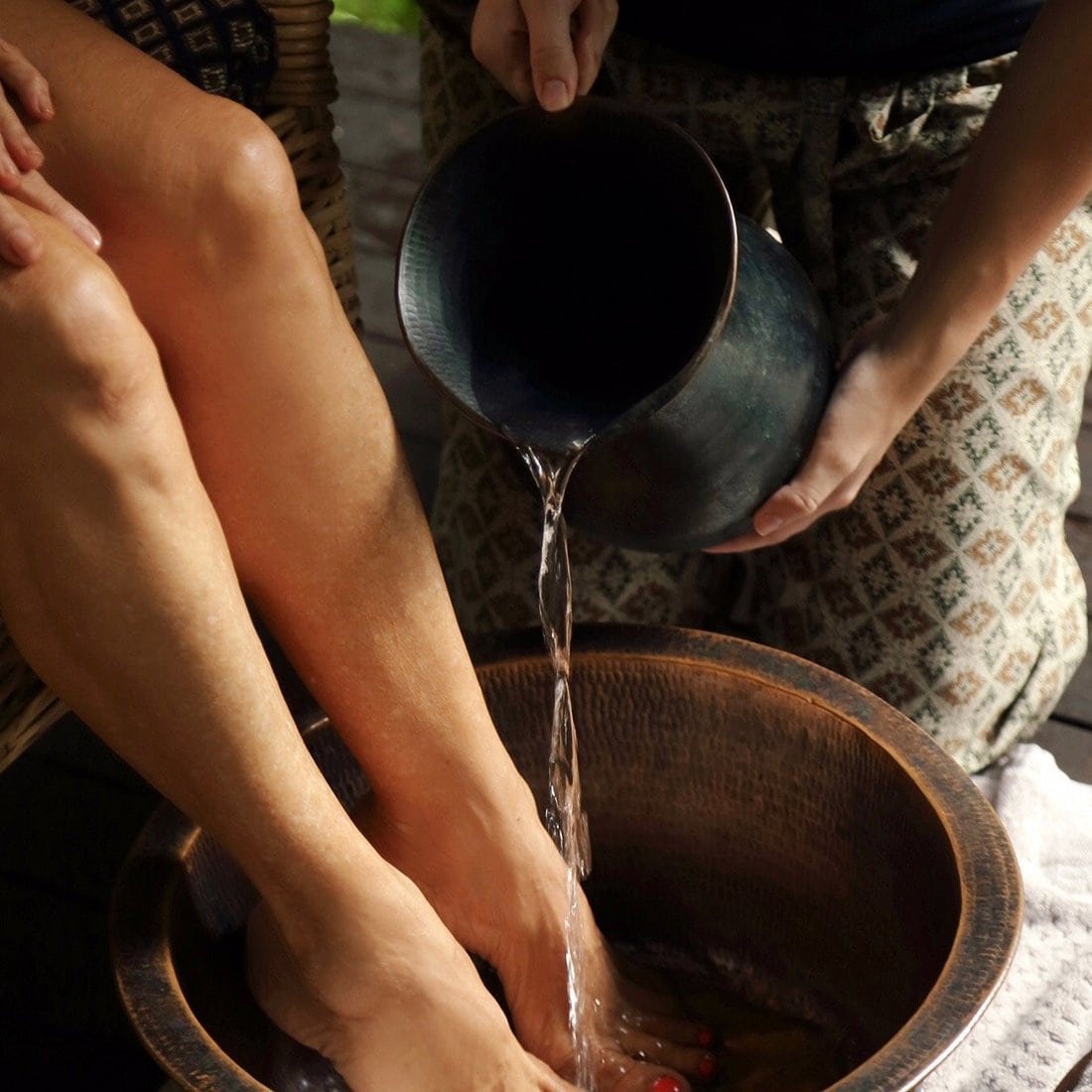 Ikatan day spa Noosa, woman receiving a foot massage and treatment at Ikatan day spa
