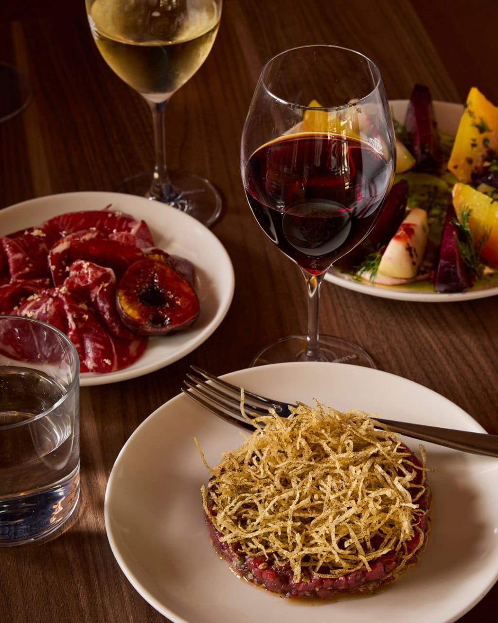 Beef tartare, carpaccio and salad with red wine at The International Sydney