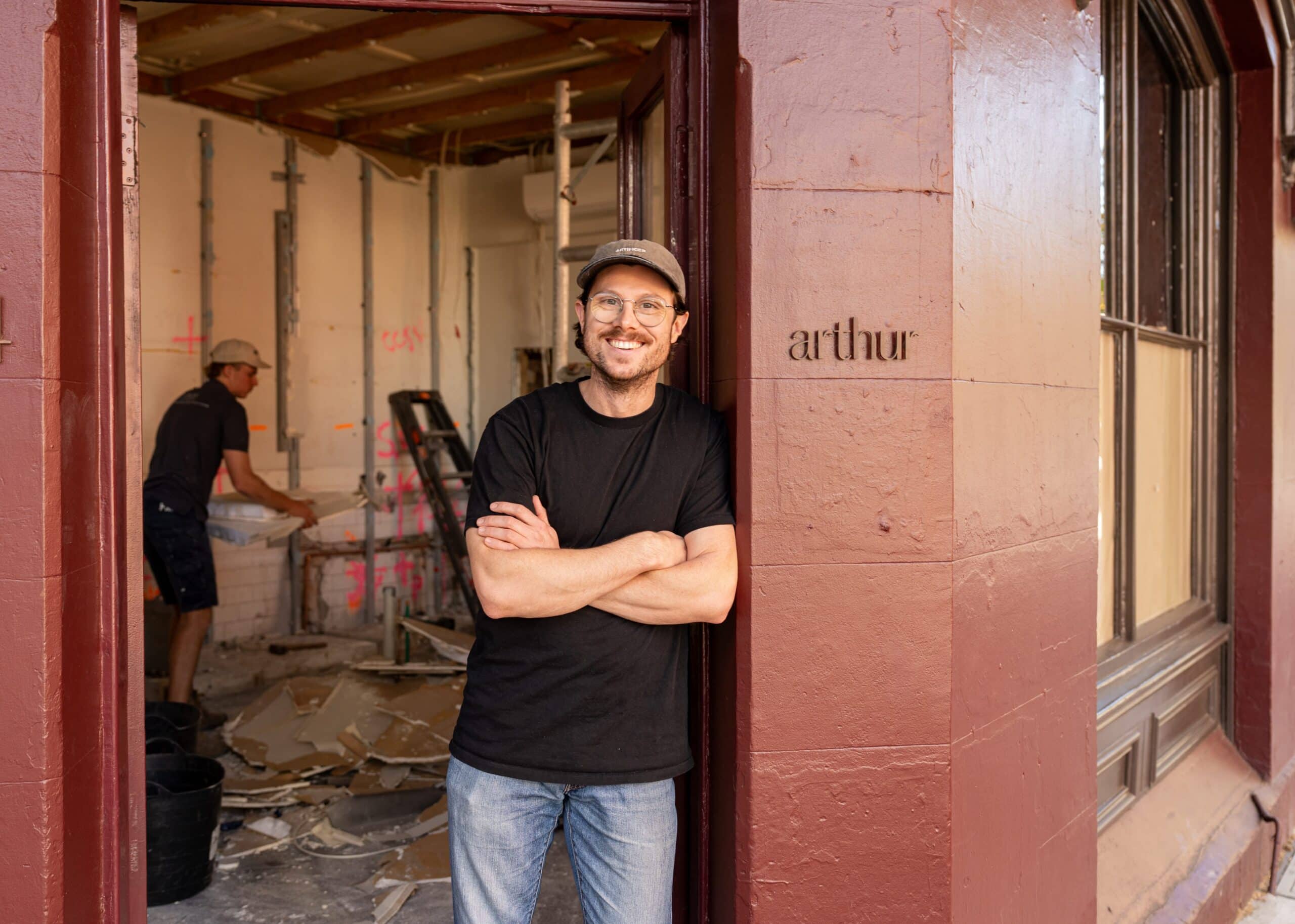 hef standing outside Arthur restaurant during renovation works Surry Hills Sydney