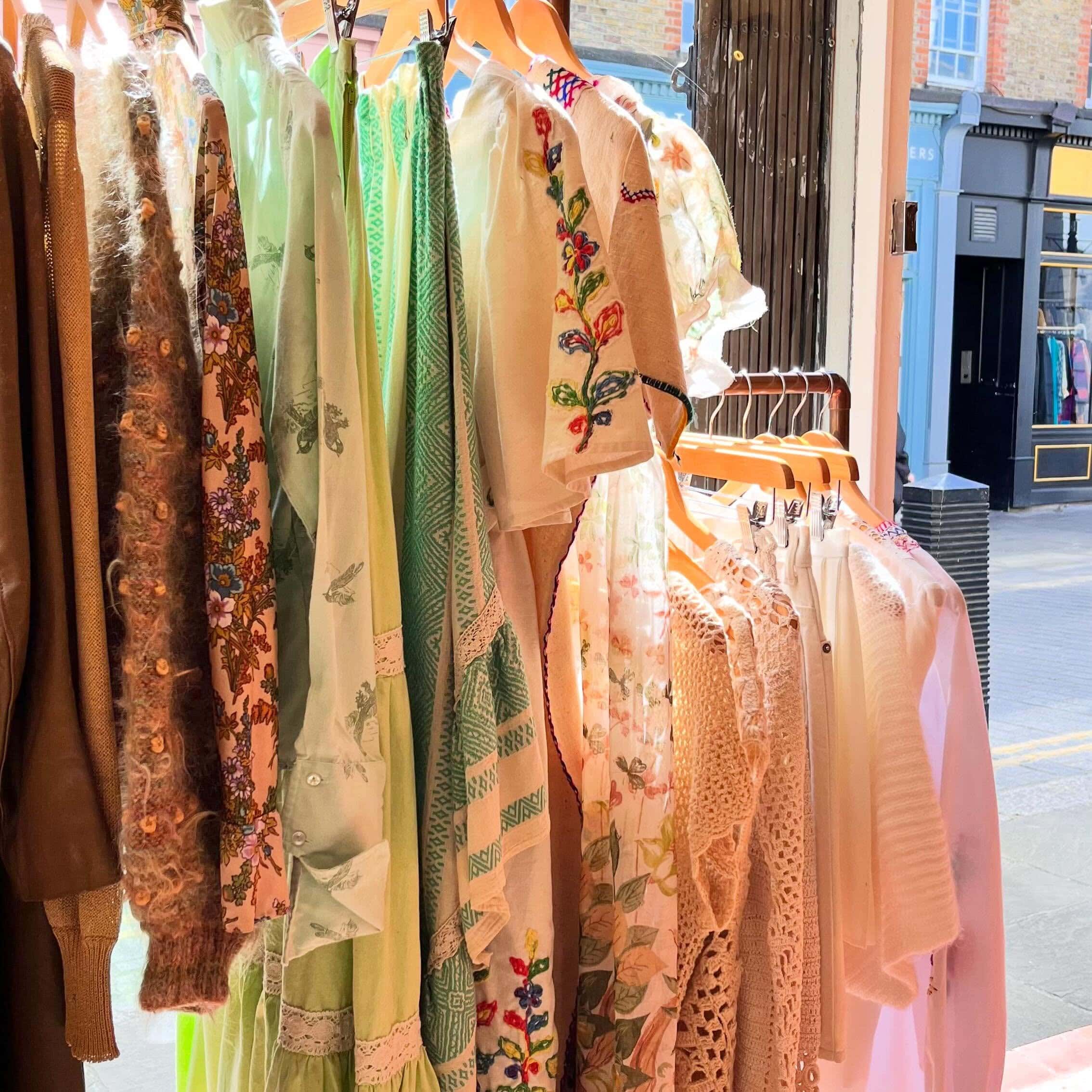 A rack of sheer vintage dresses at Magpie Vintage in Camden Passage, Angel.