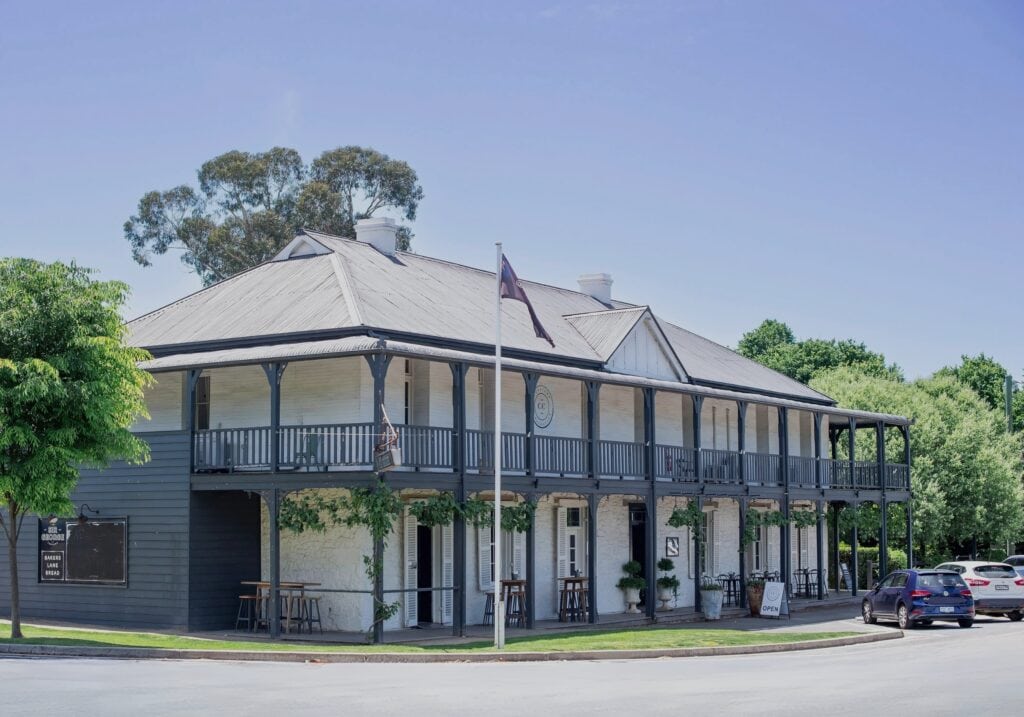 Exterior heritage facade with wraparound verandah at The Sir George Jugiong NSW