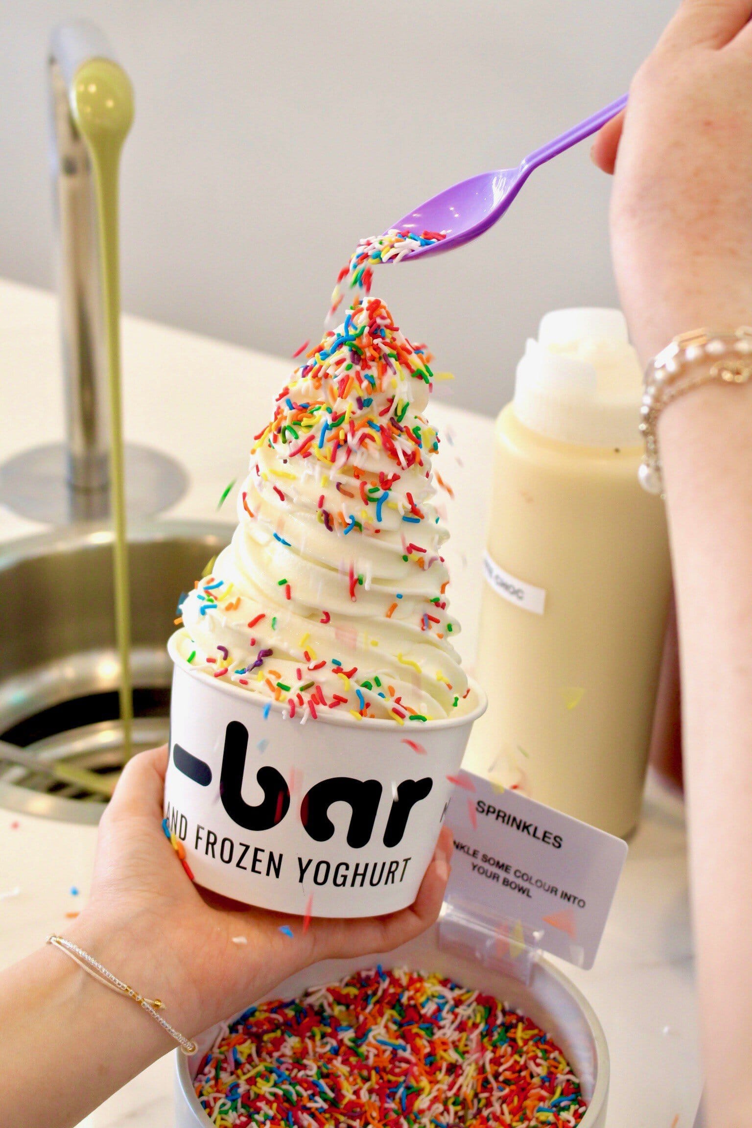 Swirled frozen yoghurt with rainbow sprinkles at Yo-Bar Canberra Centre