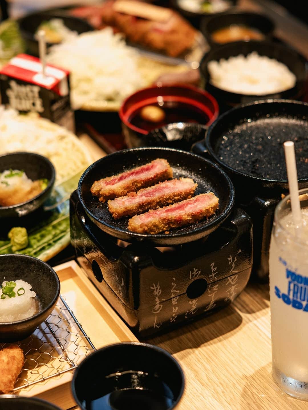 Gyukatsu Kyoto Katsugyu sliced wagyu beef cutlet on personal stone grill with rice and sides Pitt Street Sydney CBD