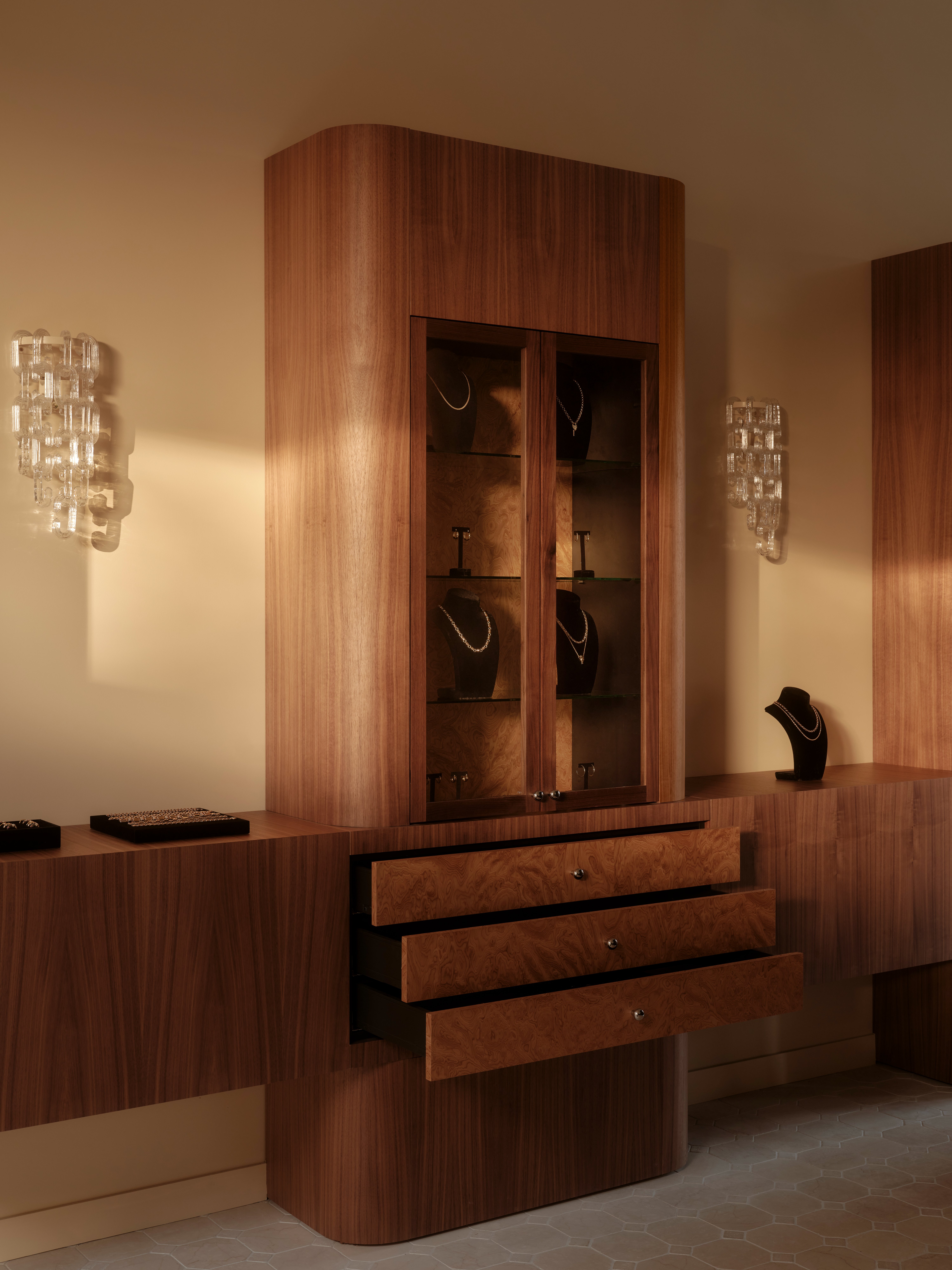 Walnut and burl joinery jewellery display cabinet with glass doors and crystal wall sconces Love Isabelle Manly Sydney