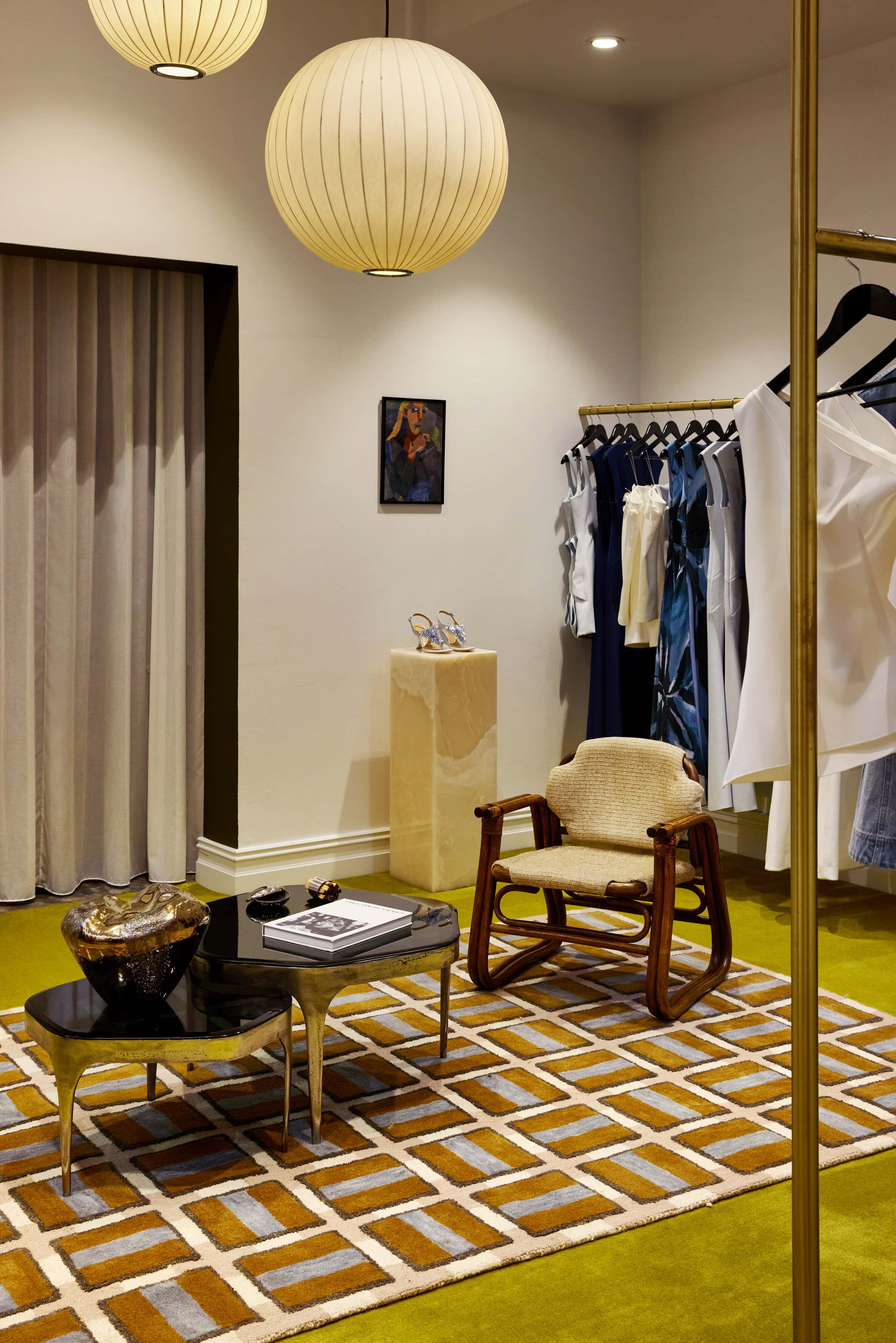 Acler store lounge and styling area with rugs and armchair Strand Arcade Sydney CBD