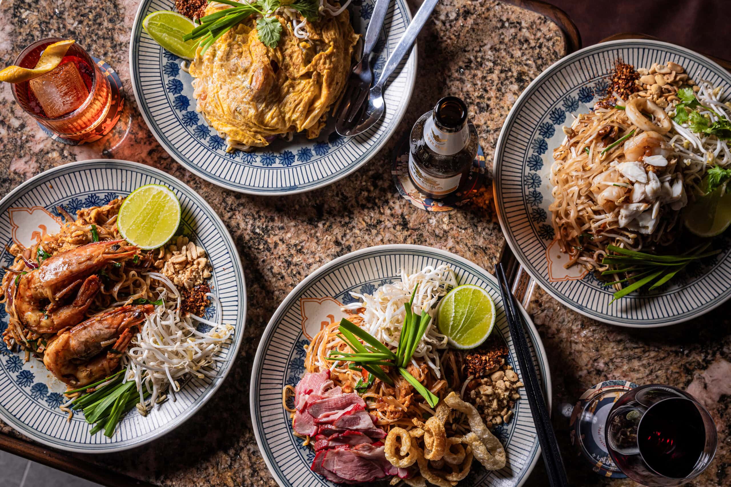 Four regional pad thai dishes with prawns pork and noodles at Krung restaurant Haymarket Sydney