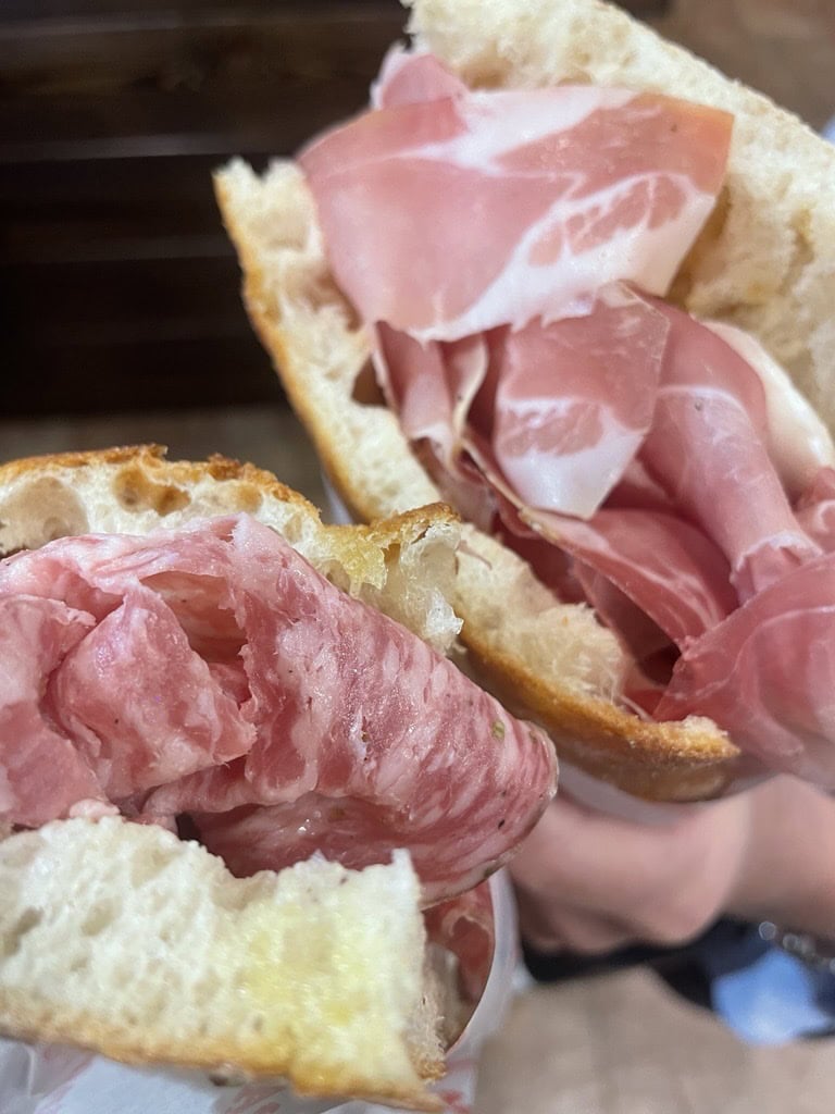 Salami and mortadella schiacciata sandwich at All'Antico Vinaio Florence