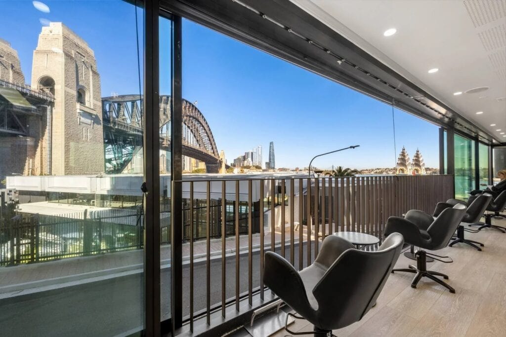 Hair salon interior with Sydney Harbour Bridge views at Wild Life Hair Milsons Point Sydney