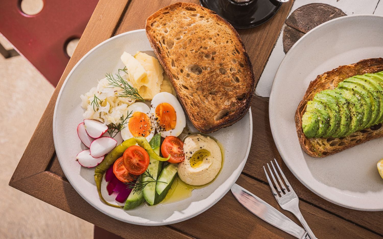 Breakfast plate with sourdough, eggs and pickles at Winnie's Sydney Opera House