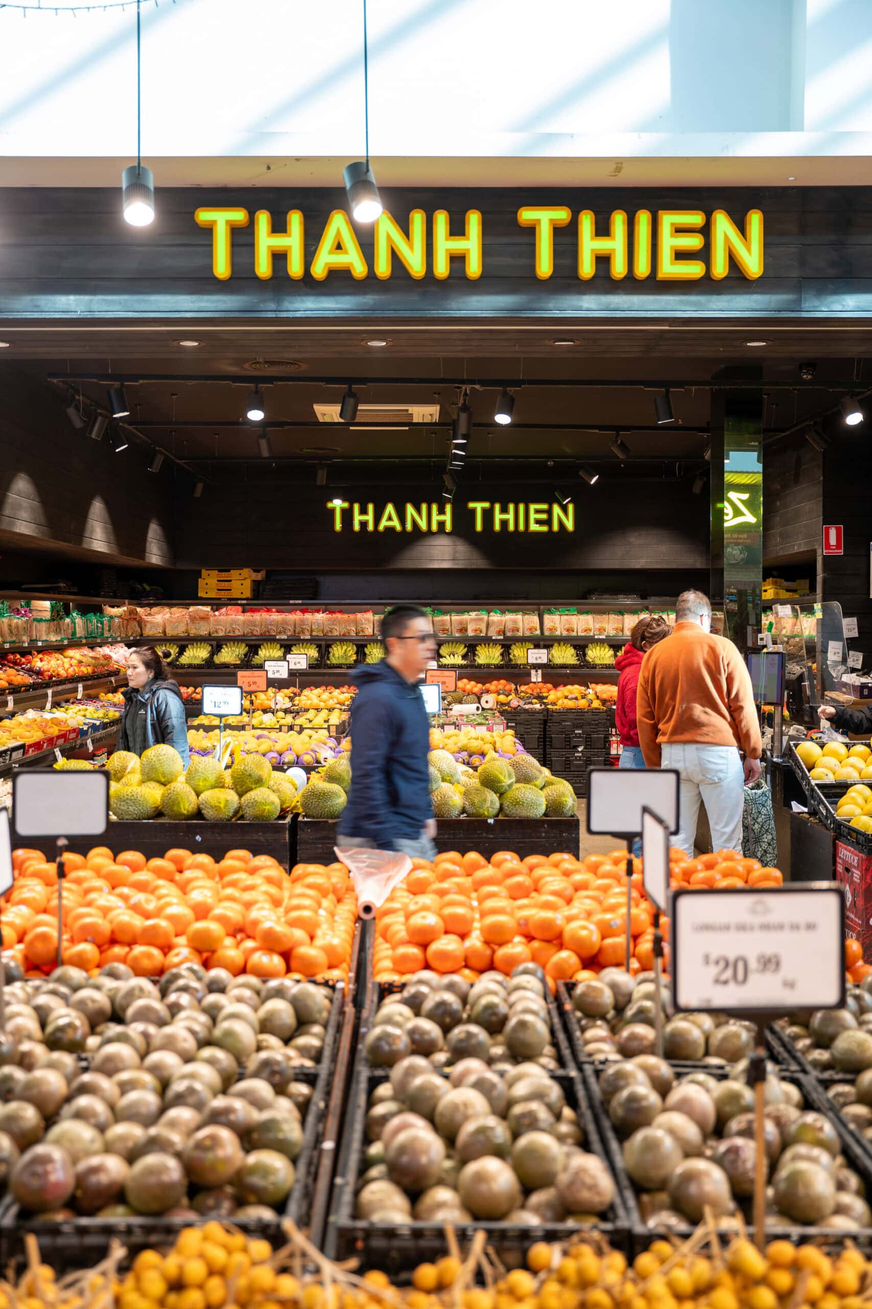 Fruit and vegetable displays at the entrance to Thanh Thien Springvale Fresh Market.
