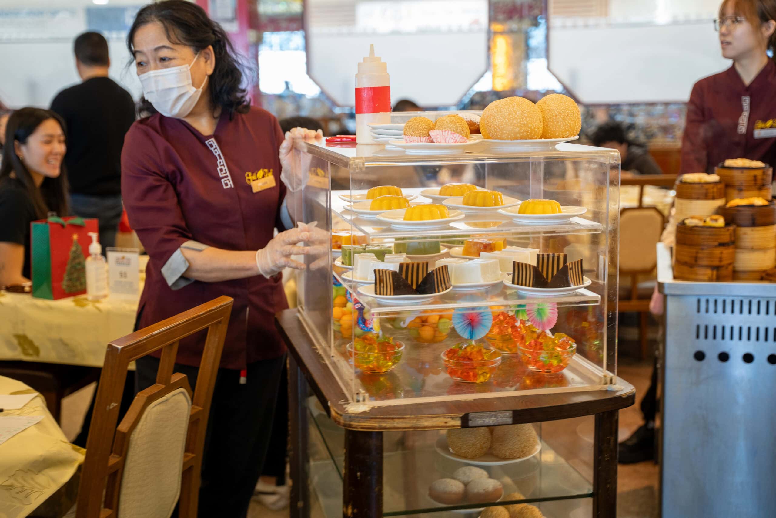 Dessert trolley with Chinese sweets being wheeled through Gold Leaf Restaurant.