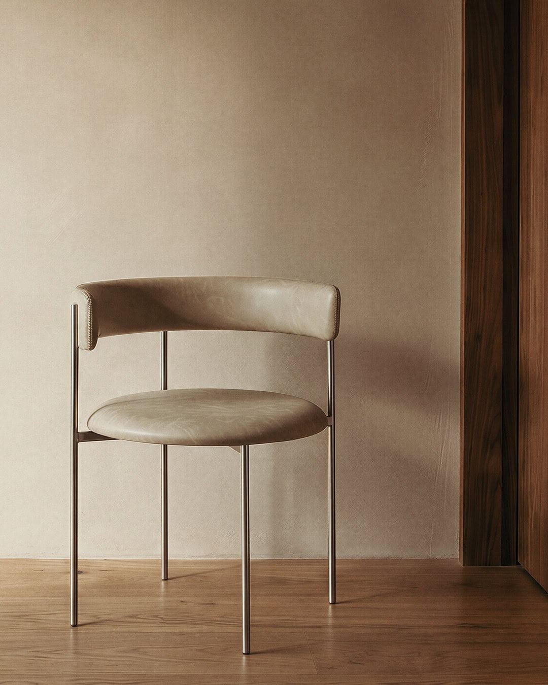 A sculptural chrome and leather chair from MCM House.