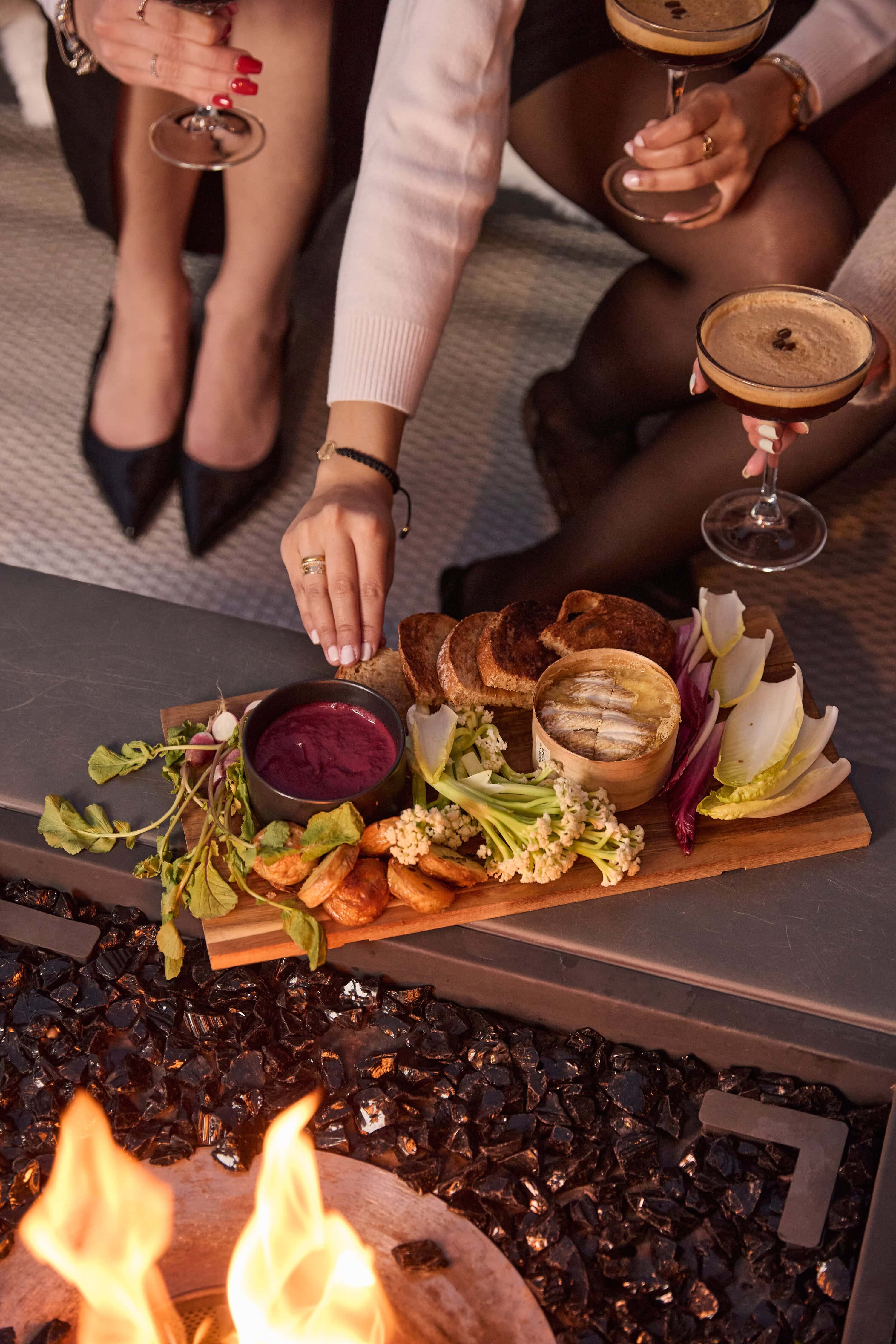 Cheese board and firepit spread at Après Harbour Pier One Sydney Harbour Dawes Point