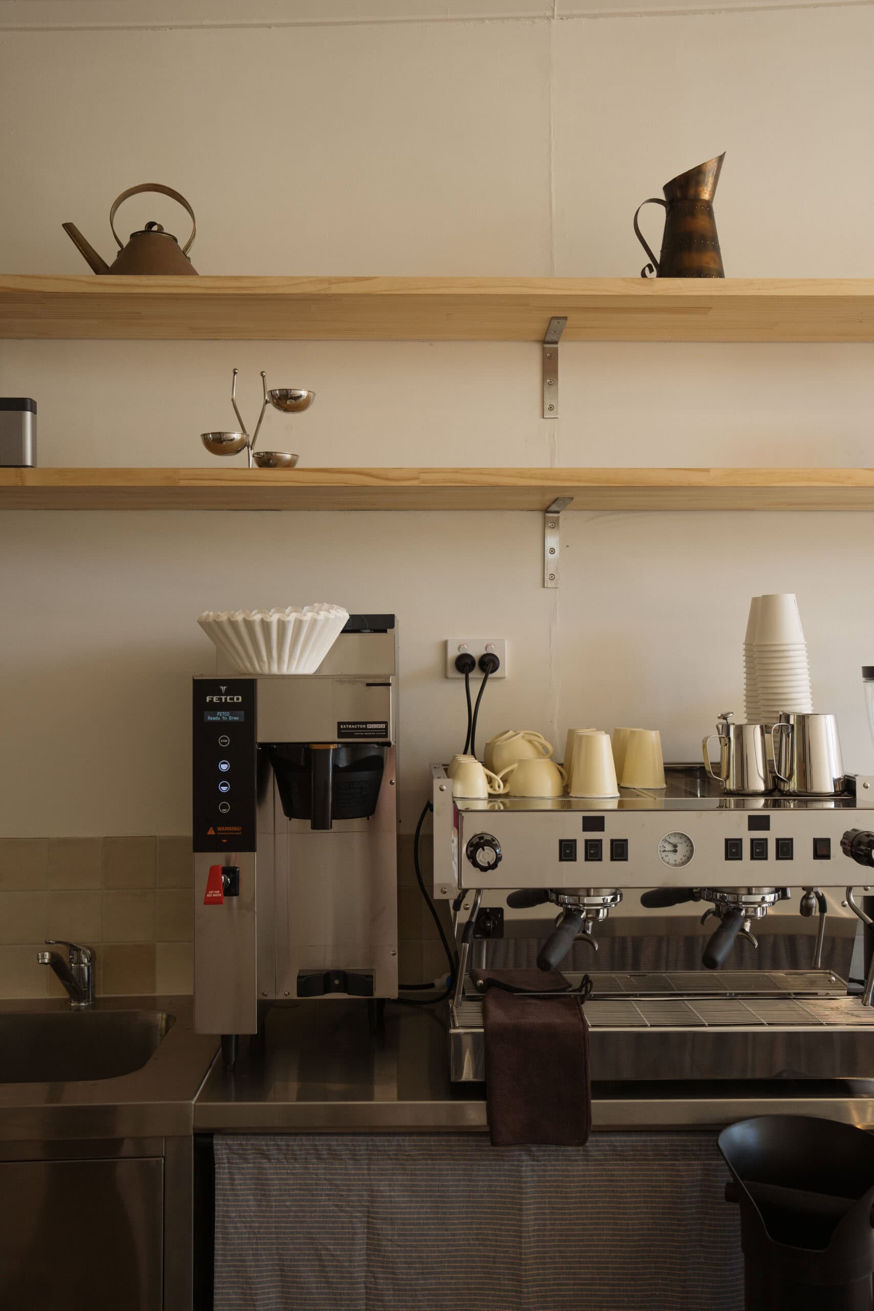 The minimalist coffee machine setup at Mesa Haus in Brisbane.