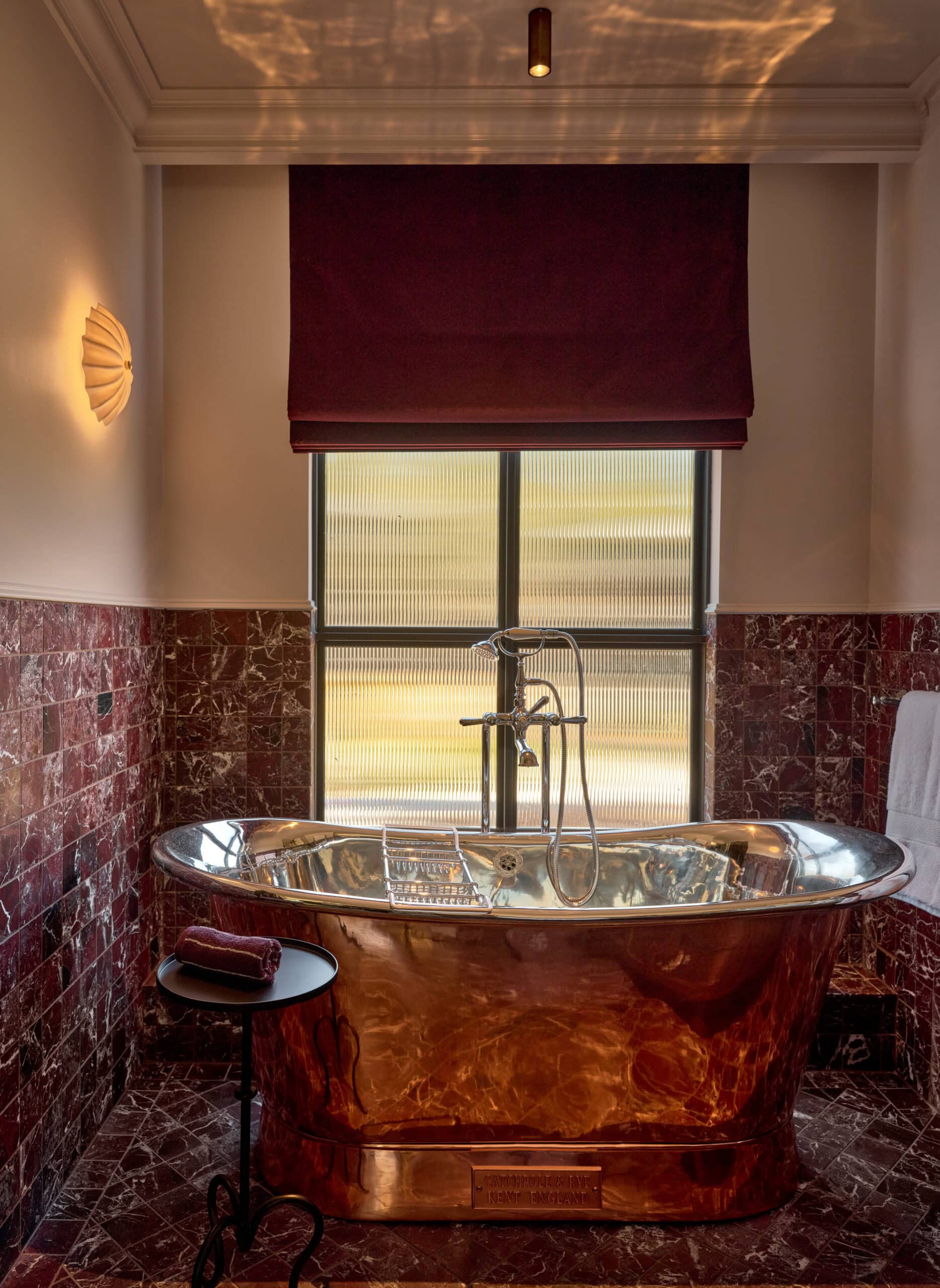 Copper bathtub in villa bathroom at The Grand Saddles Lodge Mount White NSW