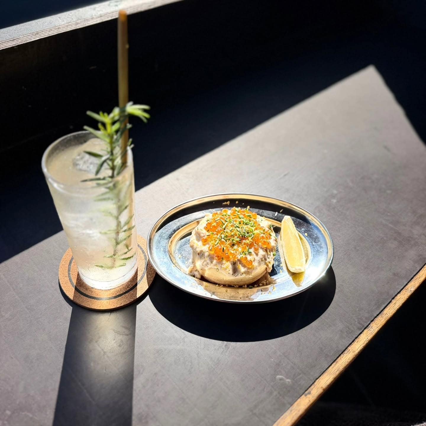 A crab crumpet and a cocktail at OTiS in Leichardt.